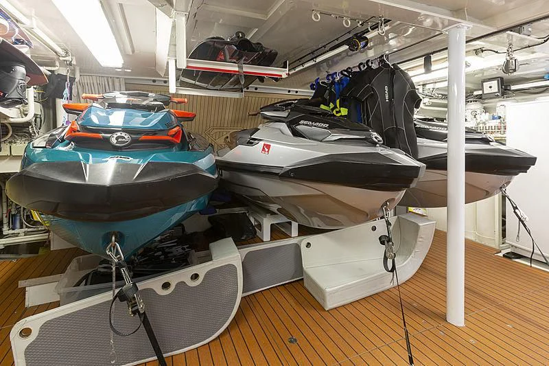 a group of boats in a large room aboard LUMIR Yacht for Sale