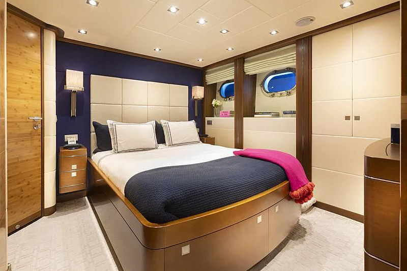 a bed in a room aboard LUMIR Yacht for Sale