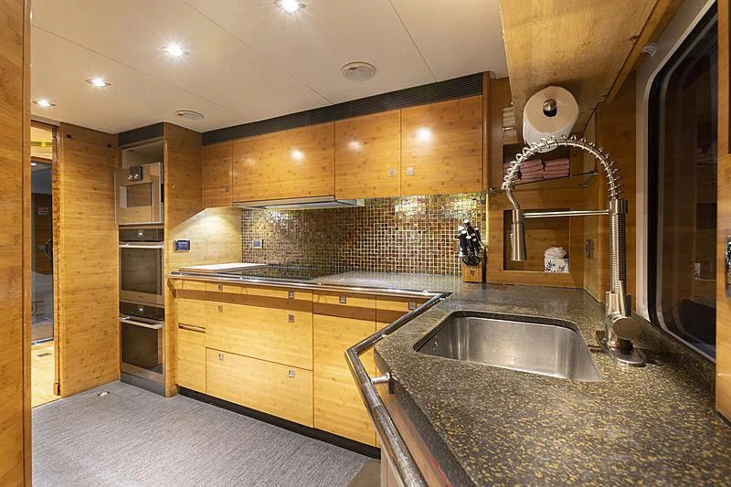 a kitchen with a large sink aboard LUMIR Yacht for Sale
