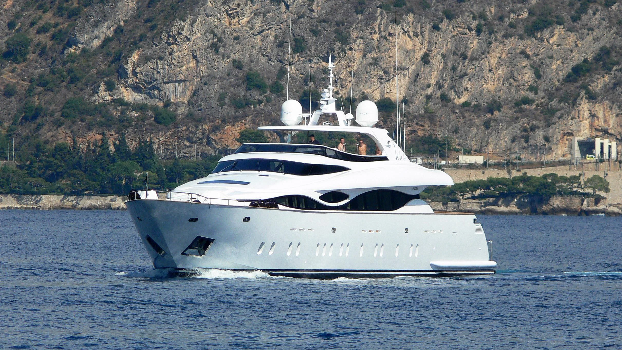 a white boat on the water aboard WHITE KNIGHT Yacht for Sale