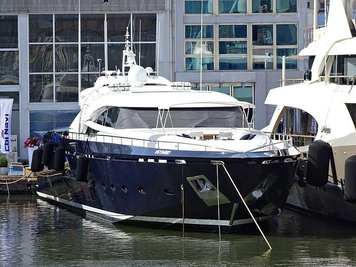 a boat docked in a harbor aboard BLUE DEVIL Yacht for Sale