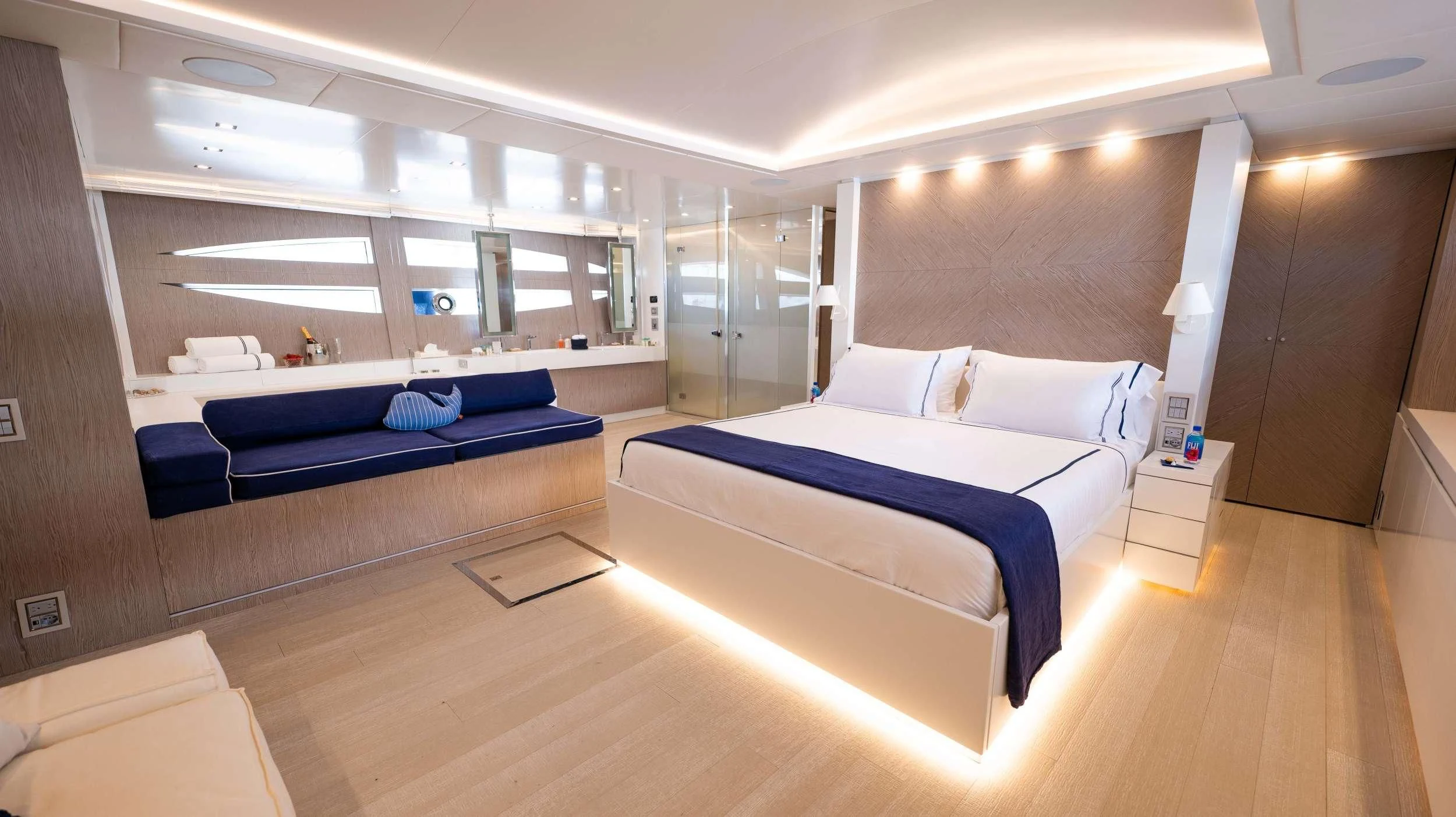 a room with a bed and a couch aboard BLUE DEVIL Yacht for Sale