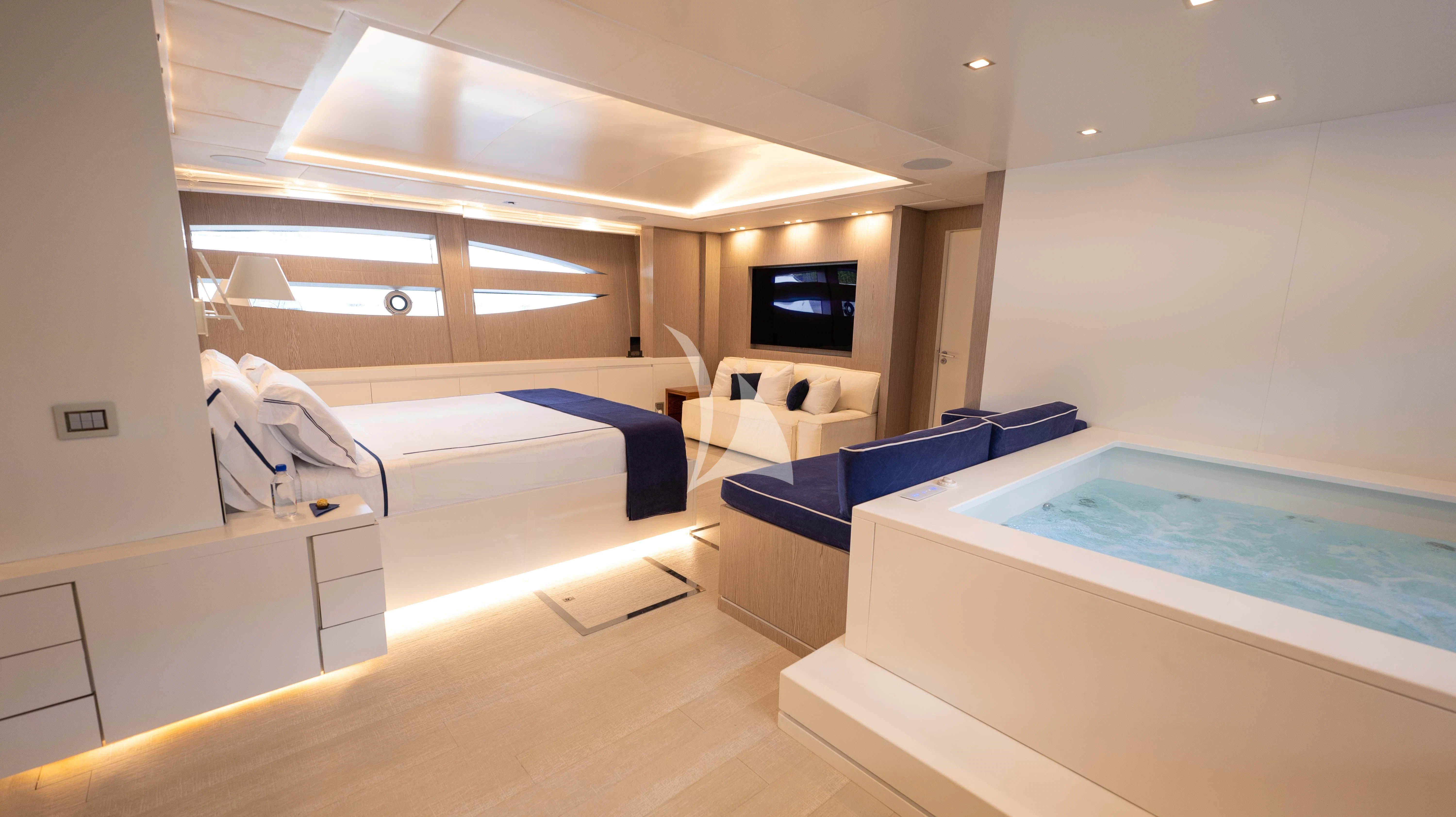 a room with a pool table and a couch aboard BLUE DEVIL Yacht for Sale