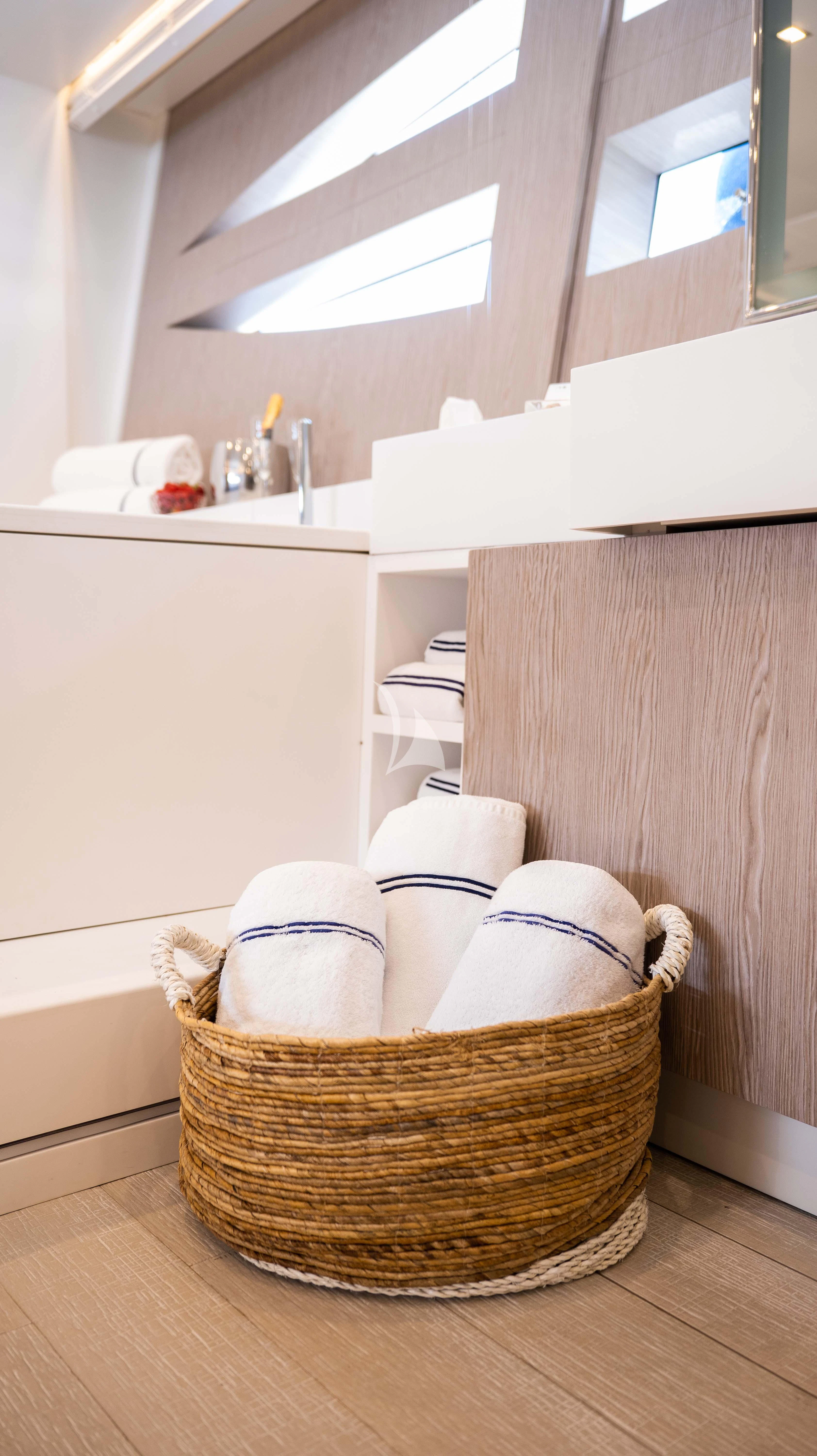 a basket of hats on a counter aboard BLUE DEVIL Yacht for Sale