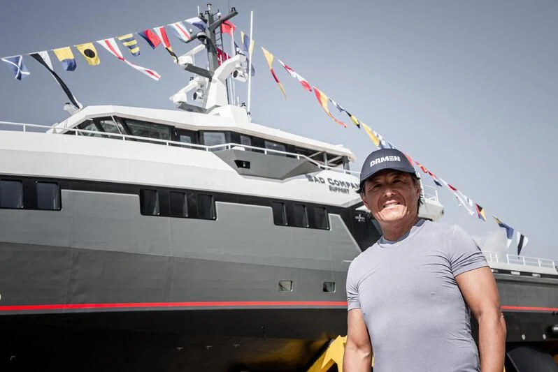 a person standing in front of a boat aboard BAD COMPANY SUPPORT Yacht for Sale