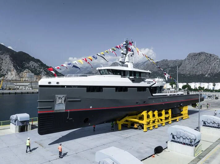 a large boat docked at a port aboard BAD COMPANY SUPPORT Yacht for Sale
