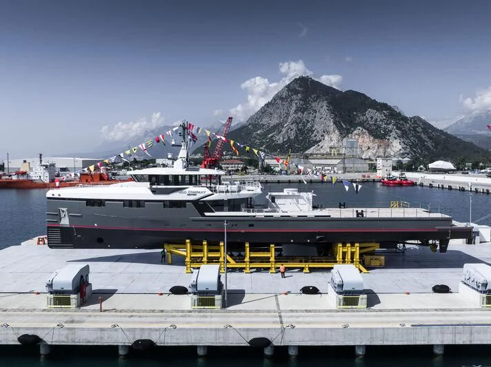 a large ship docked at a port aboard BAD COMPANY SUPPORT Yacht for Sale