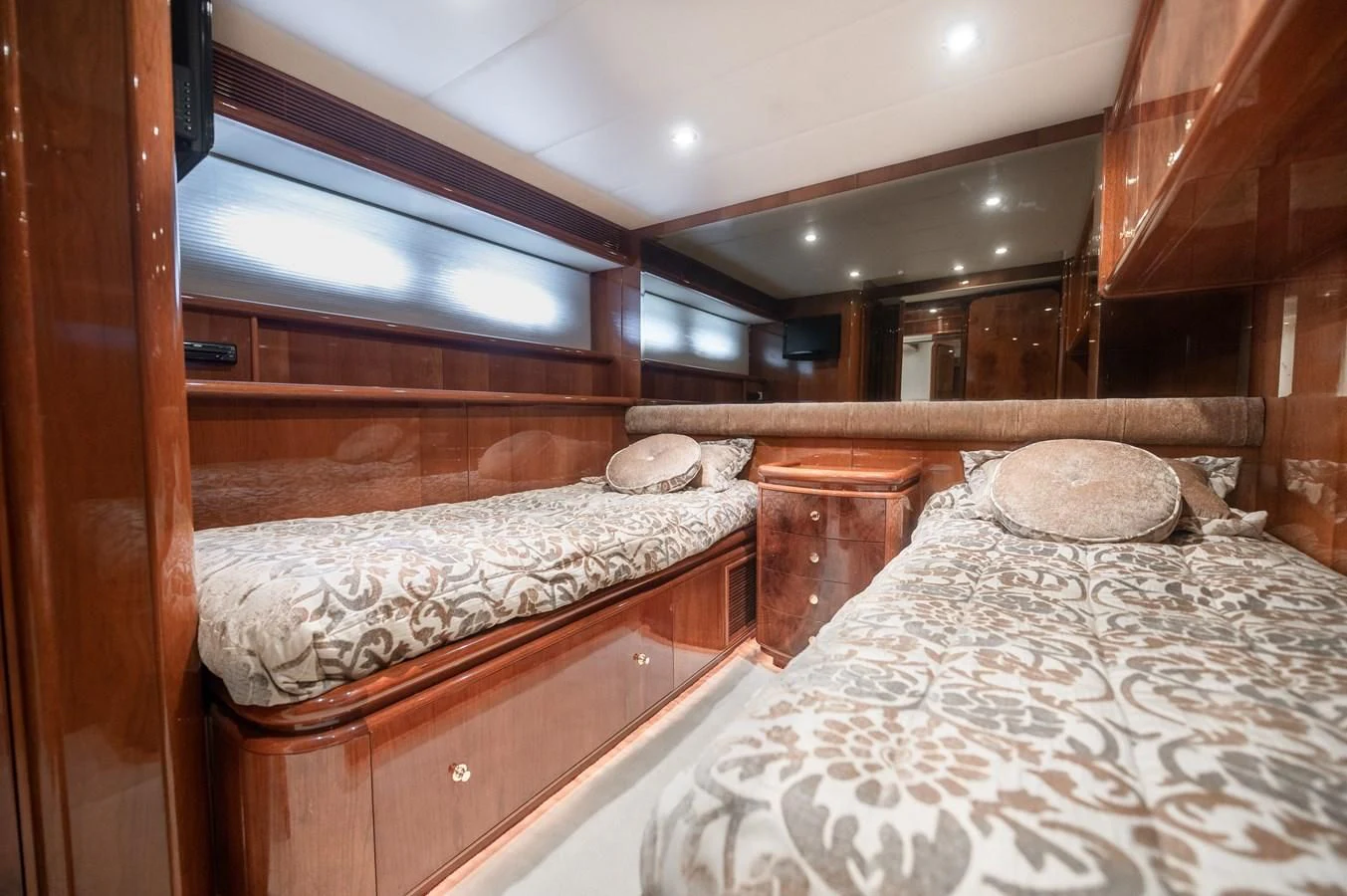 a couple of beds in a room aboard DOLCE VITA Yacht for Sale