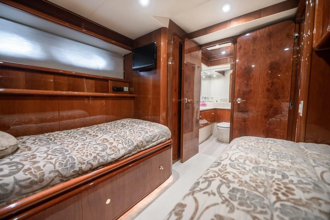 a room with two beds aboard DOLCE VITA Yacht for Sale