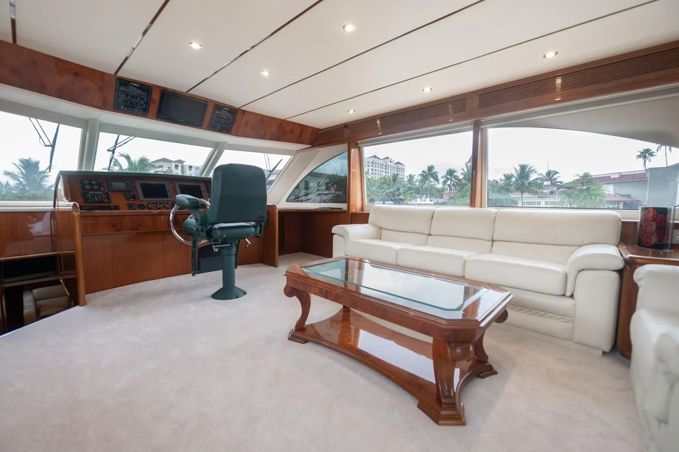 a living room with a couch and a chair aboard DOLCE VITA Yacht for Sale