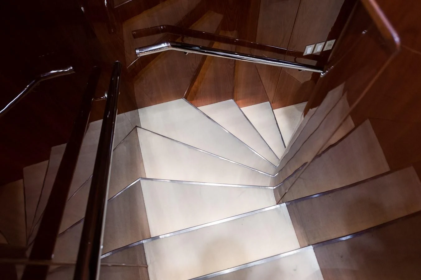 a staircase with a metal railing aboard DOLCE VITA Yacht for Sale
