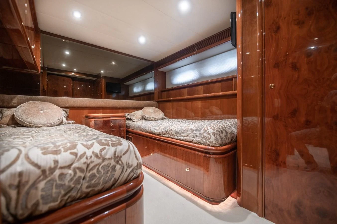 a couple of beds in a cabin aboard DOLCE VITA Yacht for Sale