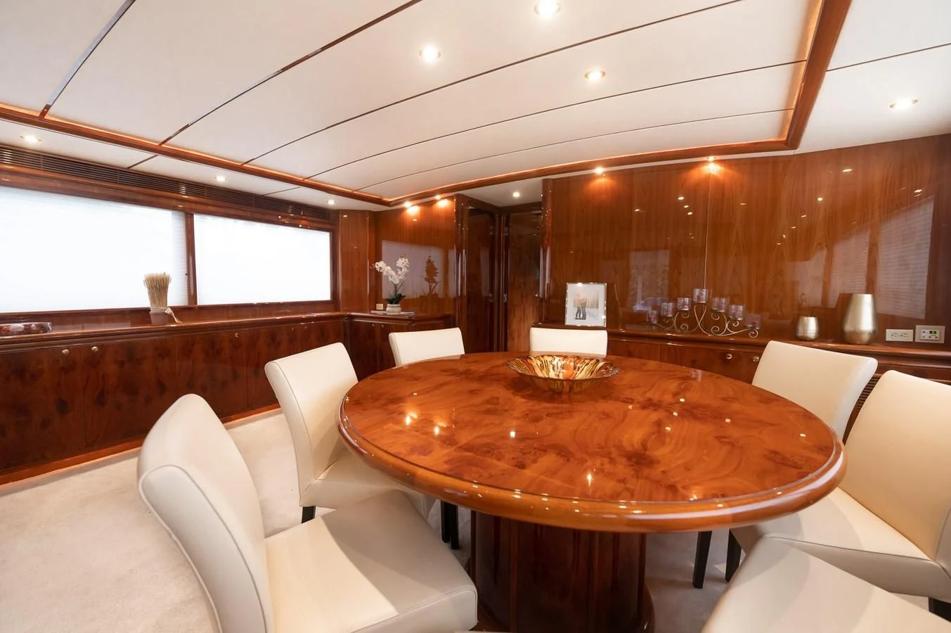 a dining table in a room aboard DOLCE VITA Yacht for Sale