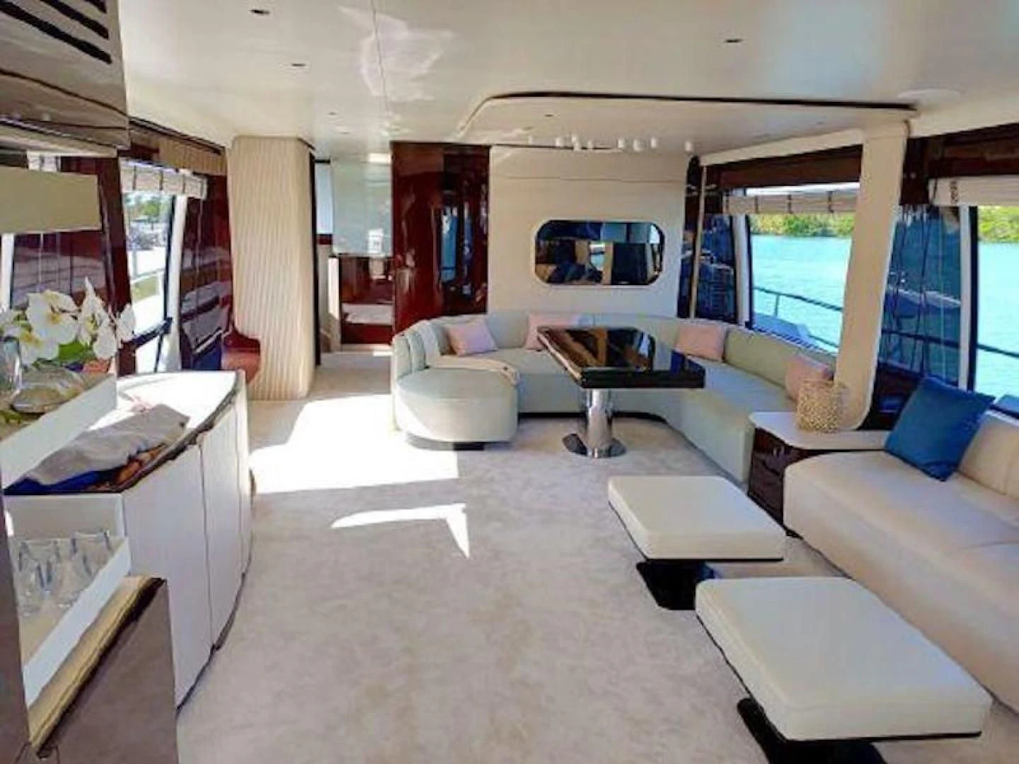 a living room with a large window aboard NOMAD Yacht for Sale