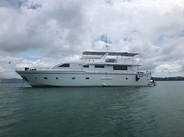 a large white boat in the water aboard BLUE DOLPHIN Yacht for Sale