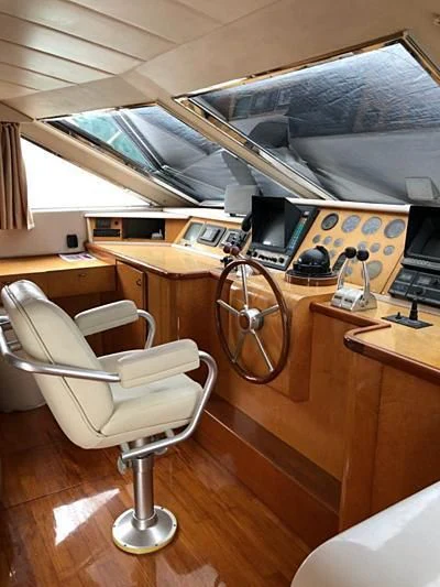 a room with a desk and a chair aboard BLUE DOLPHIN Yacht for Sale
