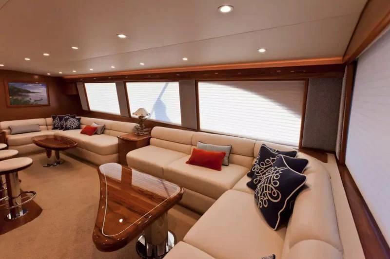 a living room with a couch and a table aboard ISLAMAR Yacht for Sale