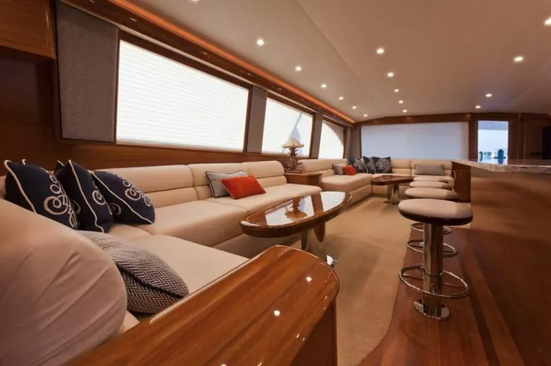 a living room with a couch and a table aboard ISLAMAR Yacht for Sale