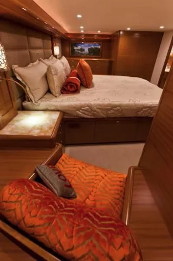 a bed with pillows on it aboard ISLAMAR Yacht for Sale