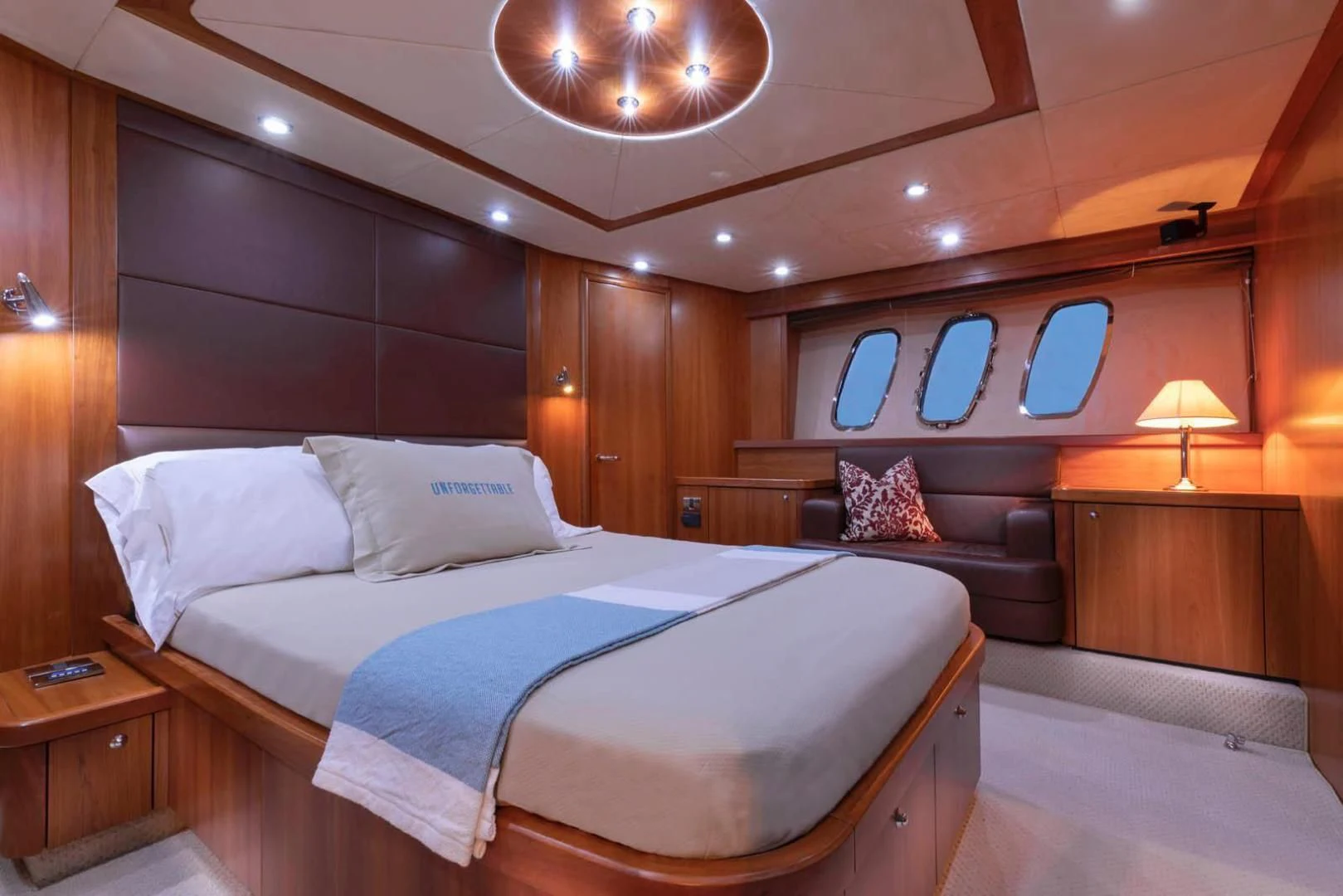a bed in a room aboard UNFORGETTABLE Yacht for Sale