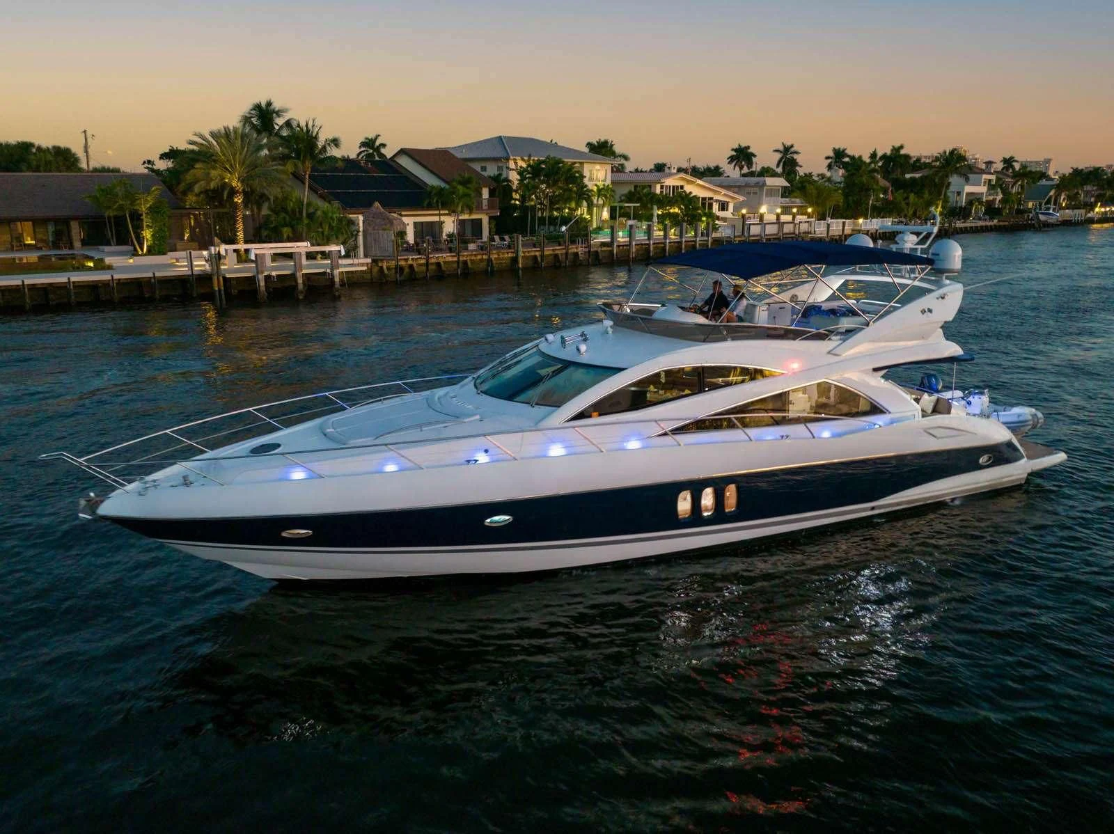 a couple of boats in a harbor aboard UNFORGETTABLE Yacht for Sale