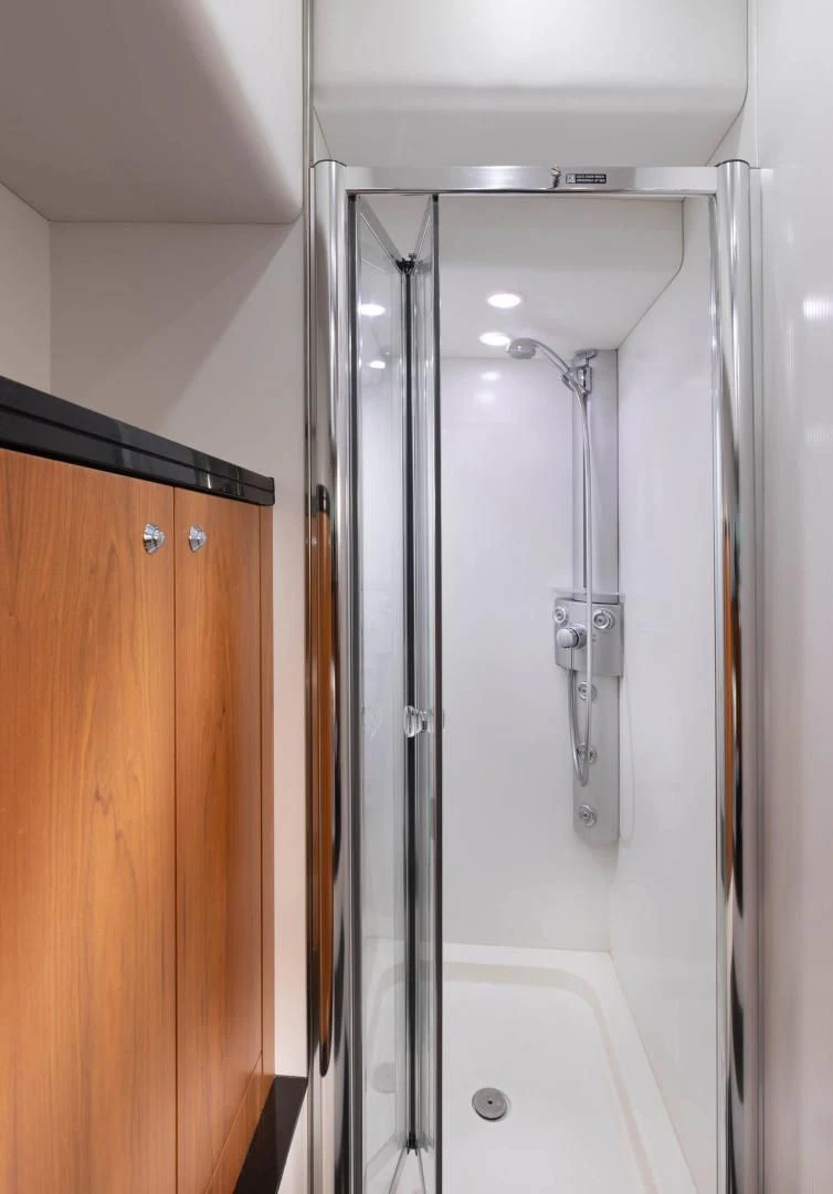 a shower unit in a bathroom aboard UNFORGETTABLE Yacht for Sale