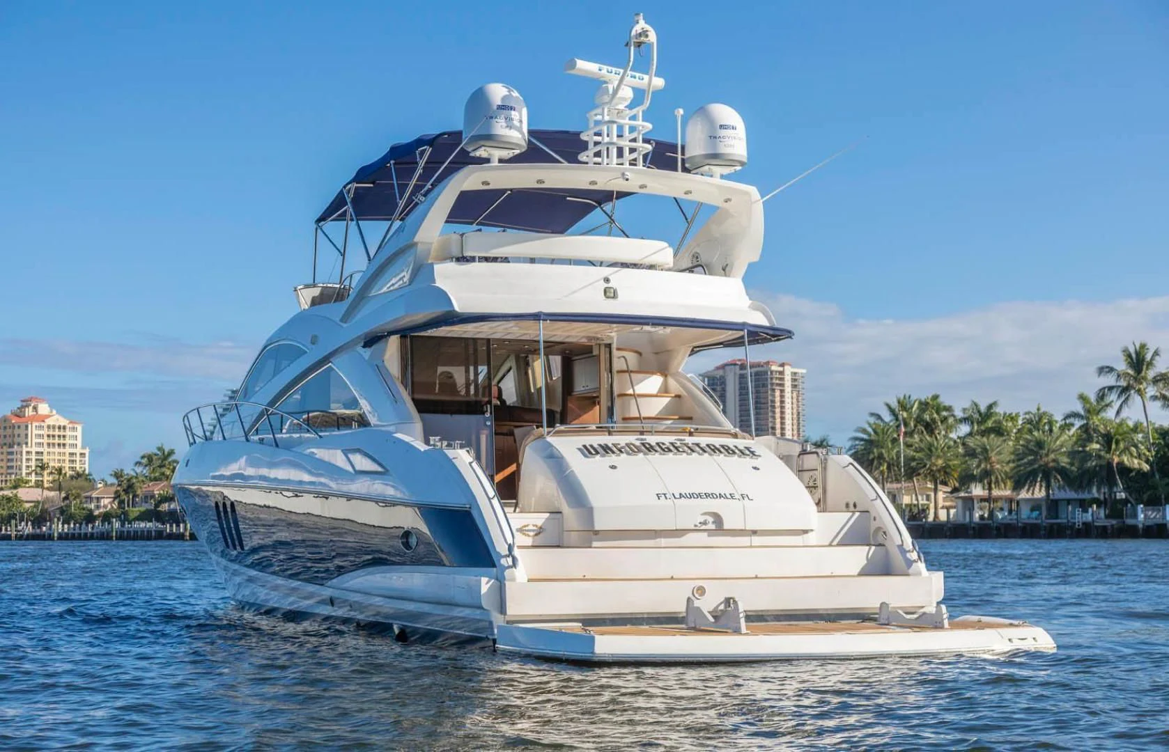 a large boat in the water aboard UNFORGETTABLE Yacht for Sale