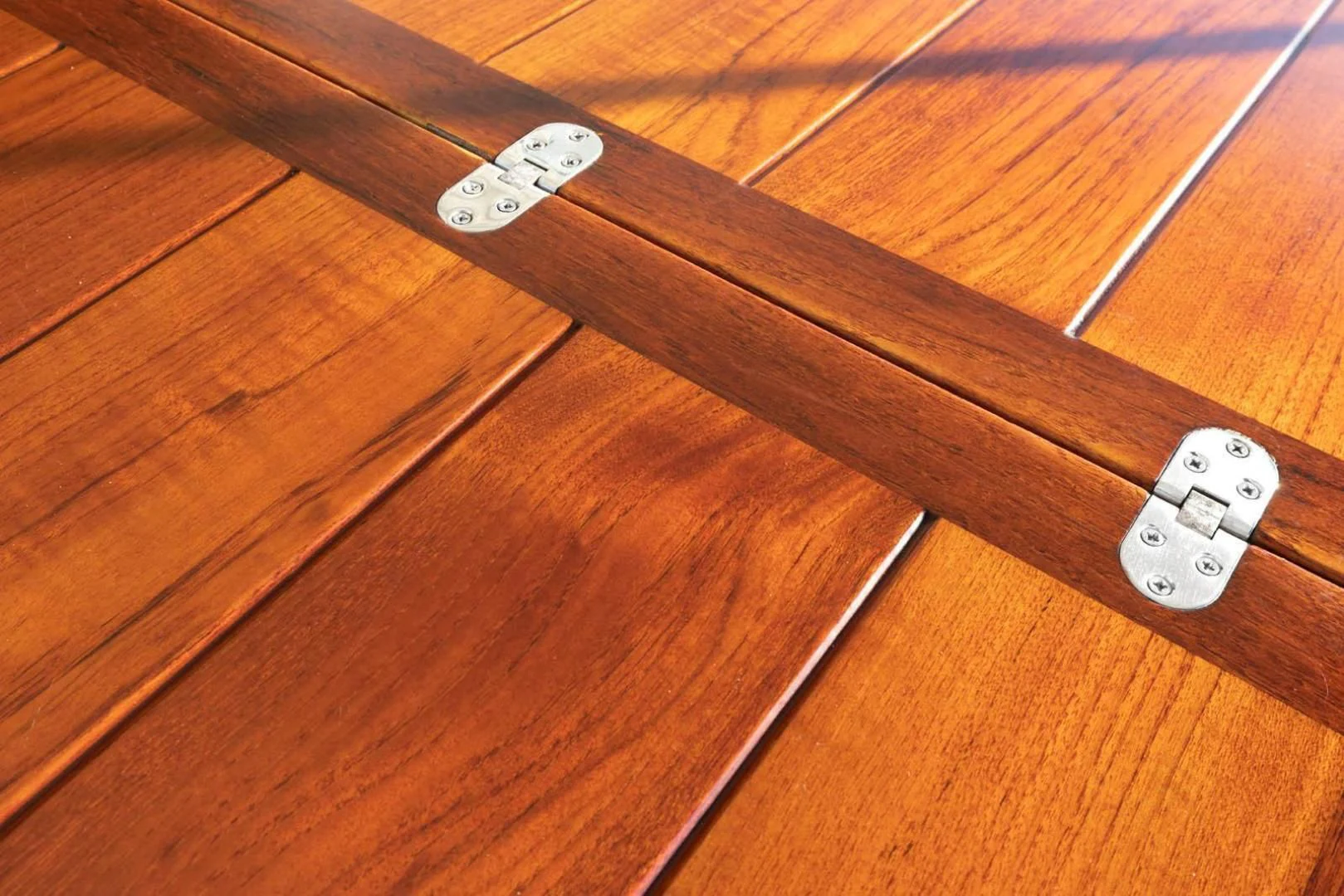 a wooden table with a few dice aboard UNFORGETTABLE Yacht for Sale