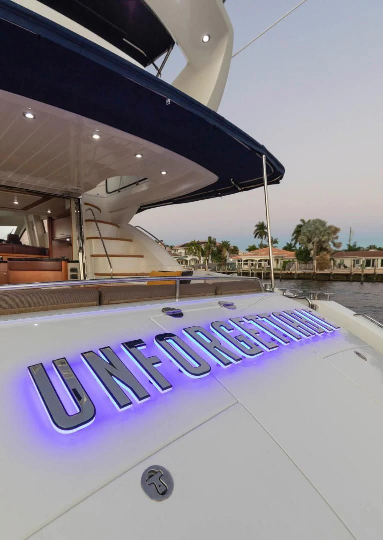 a close-up of a laptop aboard UNFORGETTABLE Yacht for Sale