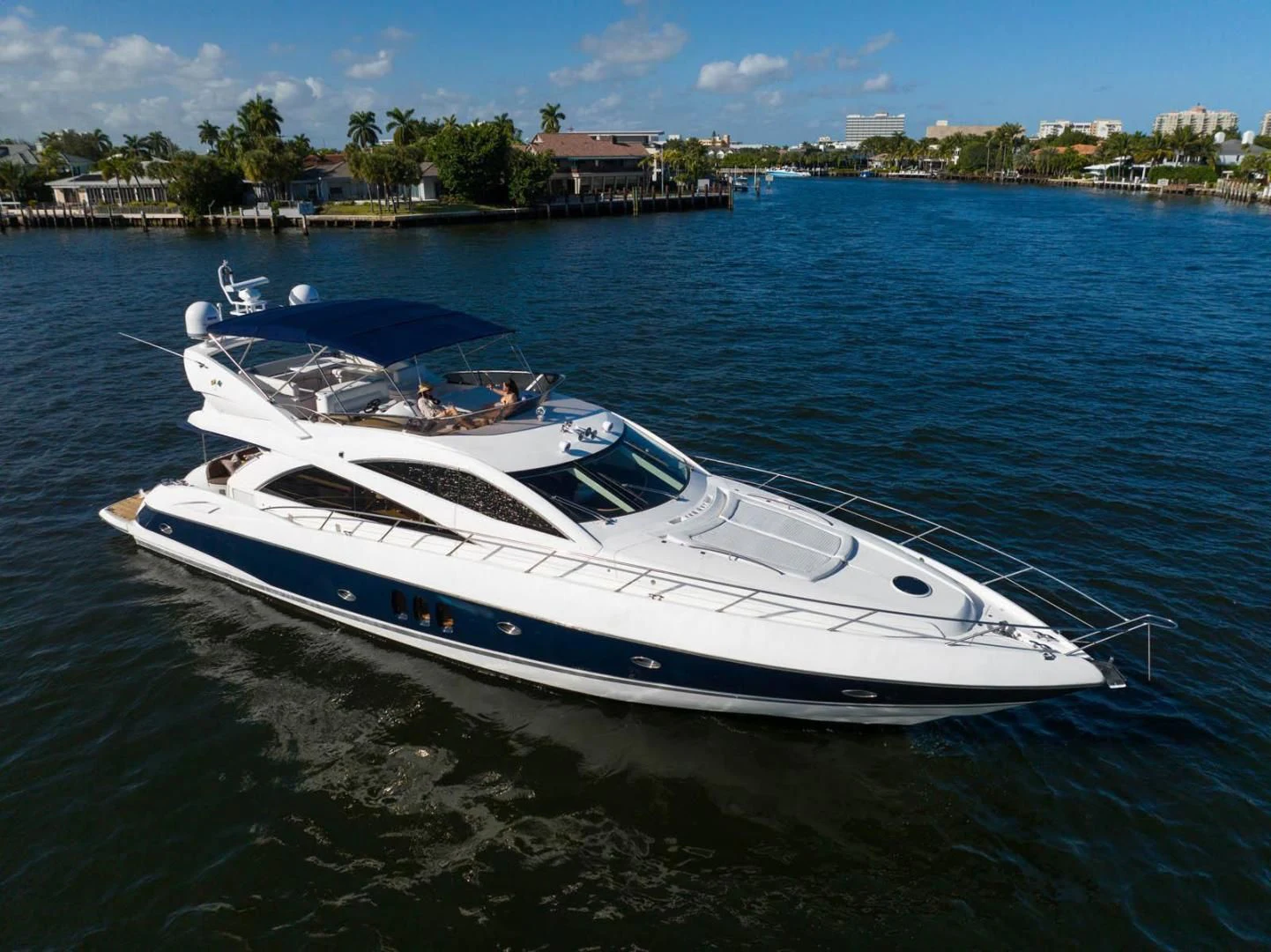a white yacht on the water aboard UNFORGETTABLE Yacht for Sale