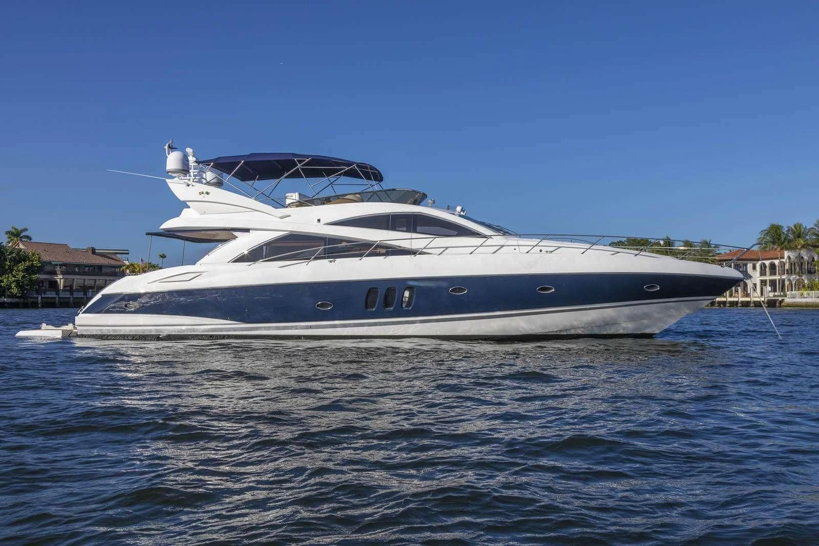 a white yacht on the water aboard UNFORGETTABLE Yacht for Sale