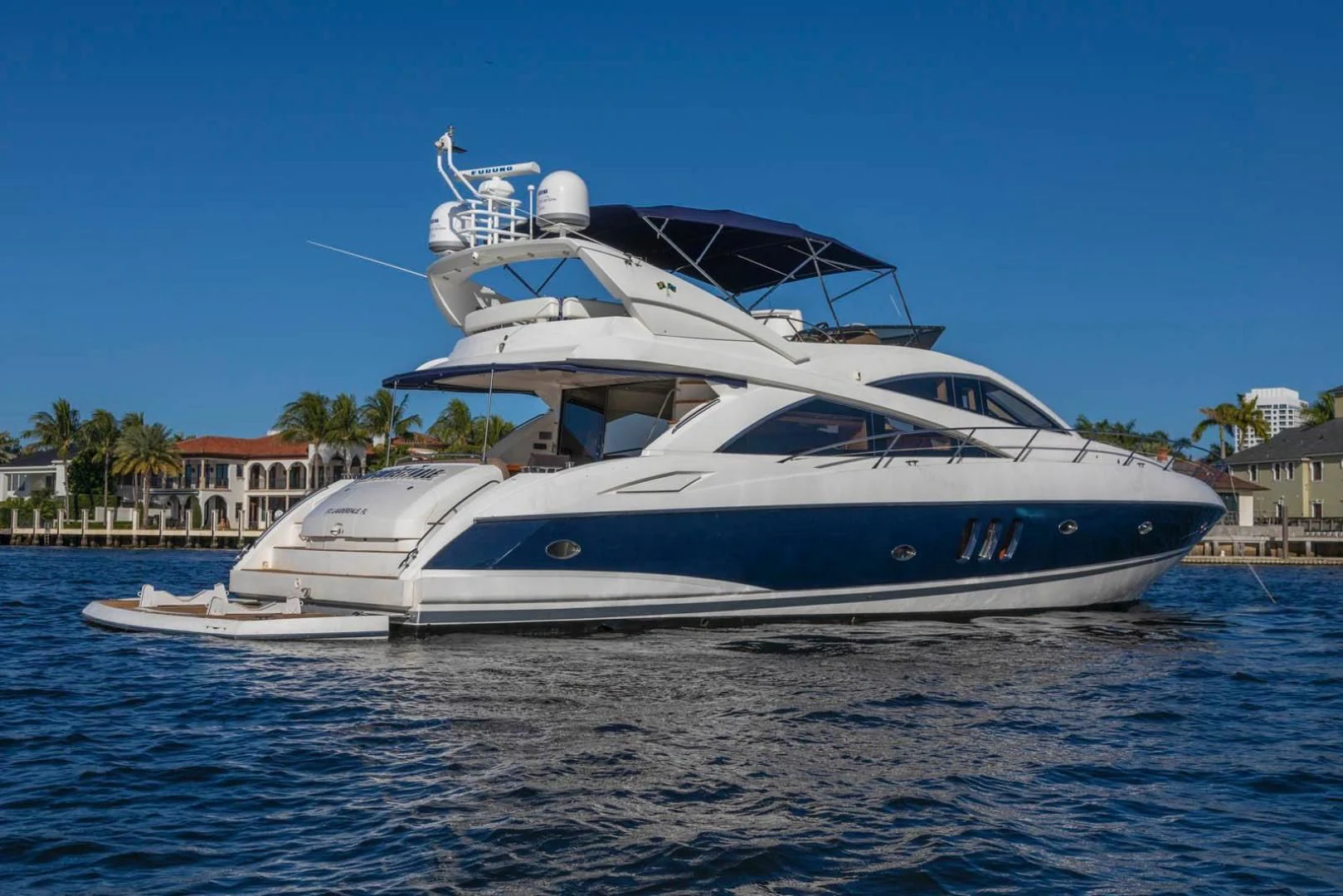 a large white yacht aboard UNFORGETTABLE Yacht for Sale