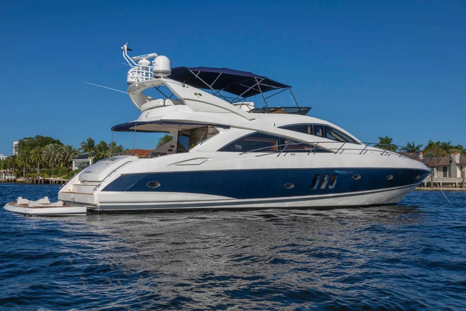 a white yacht on the water aboard UNFORGETTABLE Yacht for Sale