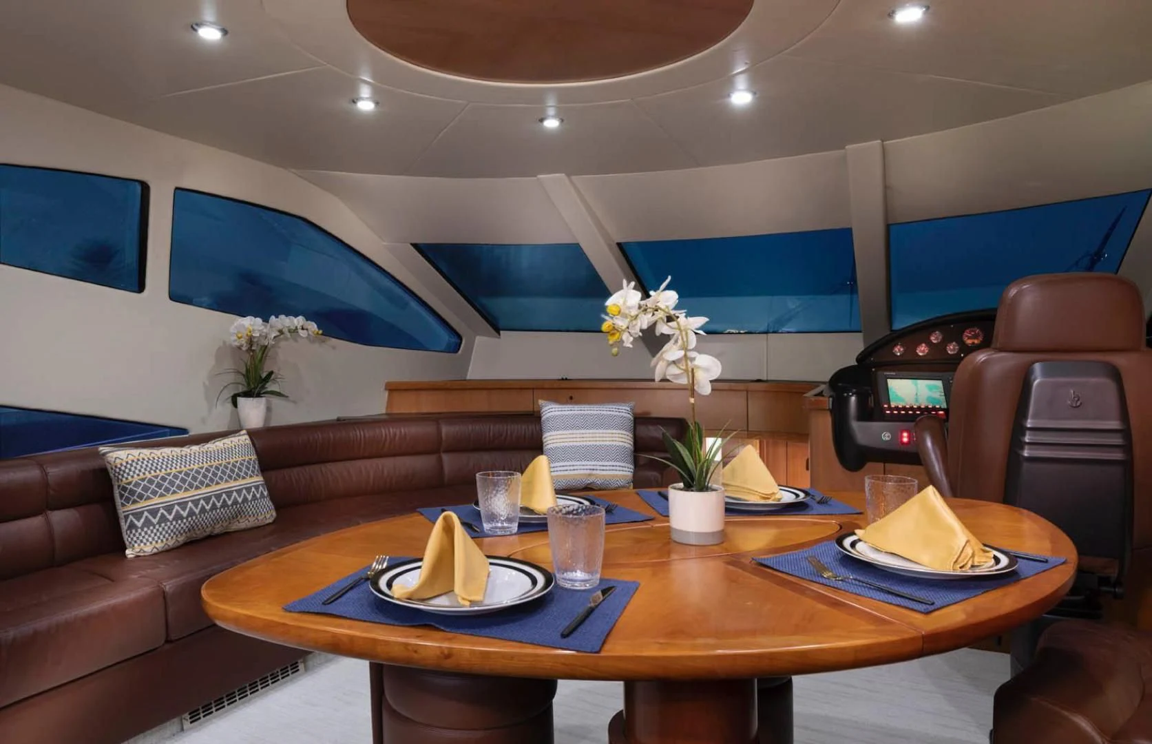 a table with food and drinks aboard UNFORGETTABLE Yacht for Sale