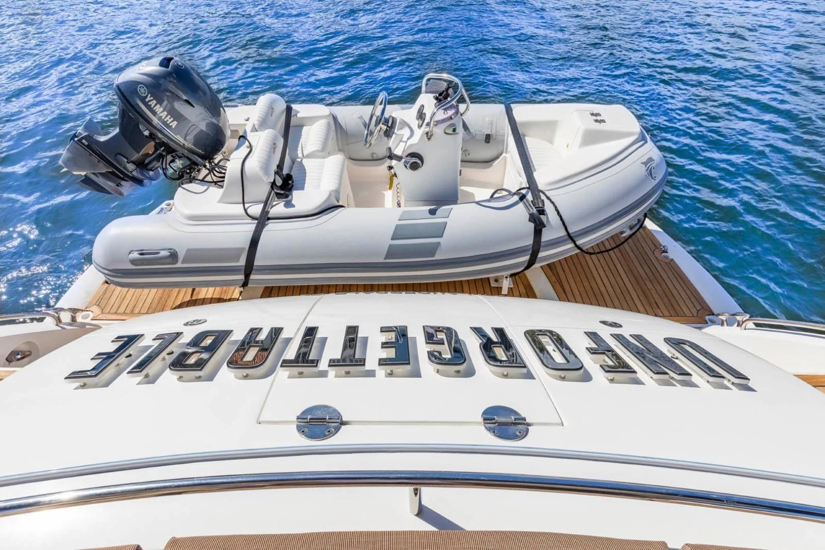 a boat with a helmet on it aboard UNFORGETTABLE Yacht for Sale