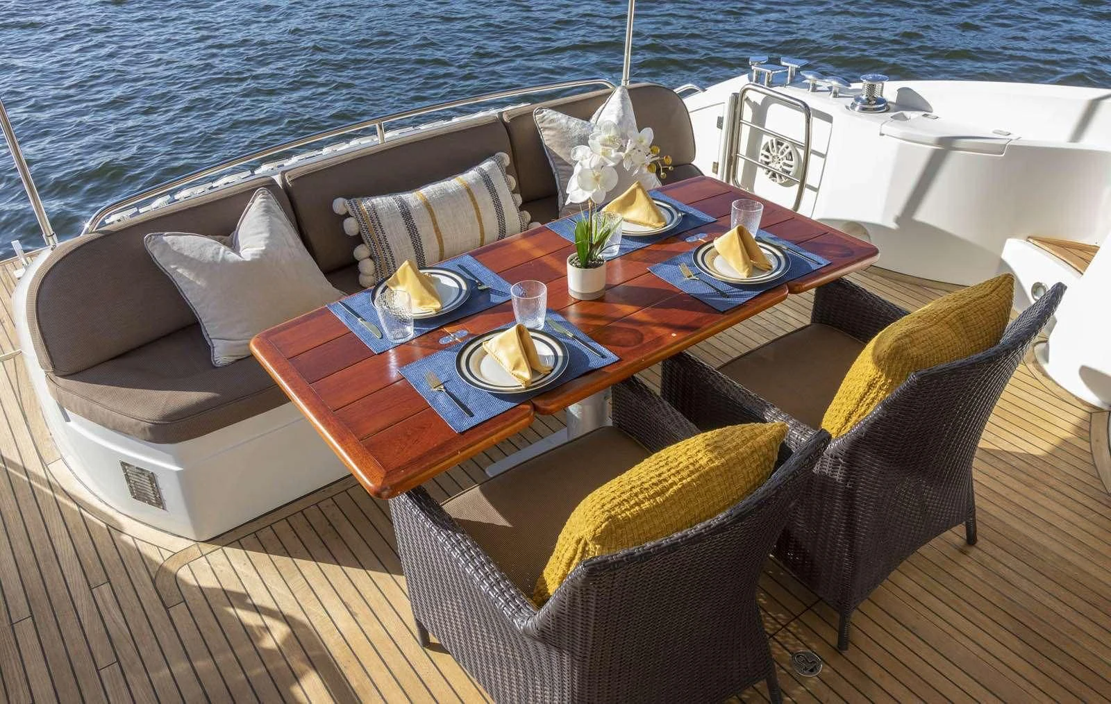 a table on a boat aboard UNFORGETTABLE Yacht for Sale