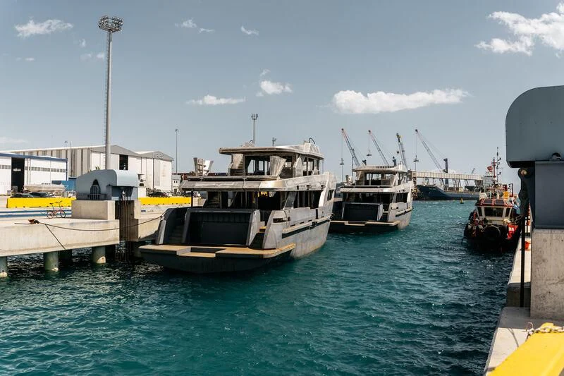 boats are parked at the dock aboard BERING 80/01 Yacht for Sale