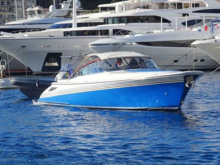 a couple of white yachts aboard QUEEN MIRI Yacht for Sale