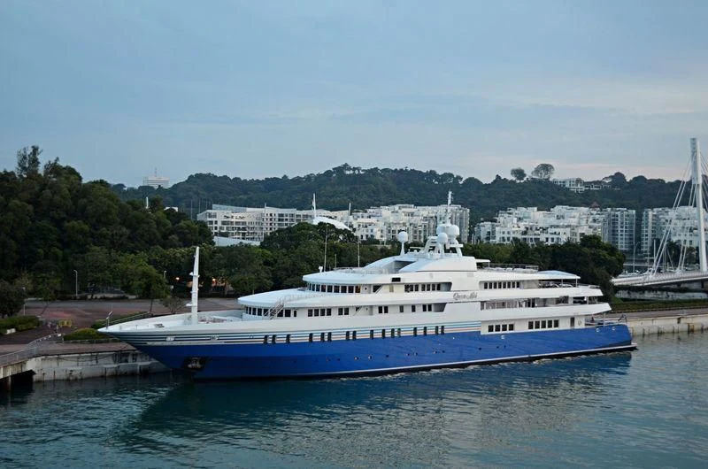 a large white boat aboard QUEEN MIRI Yacht for Sale