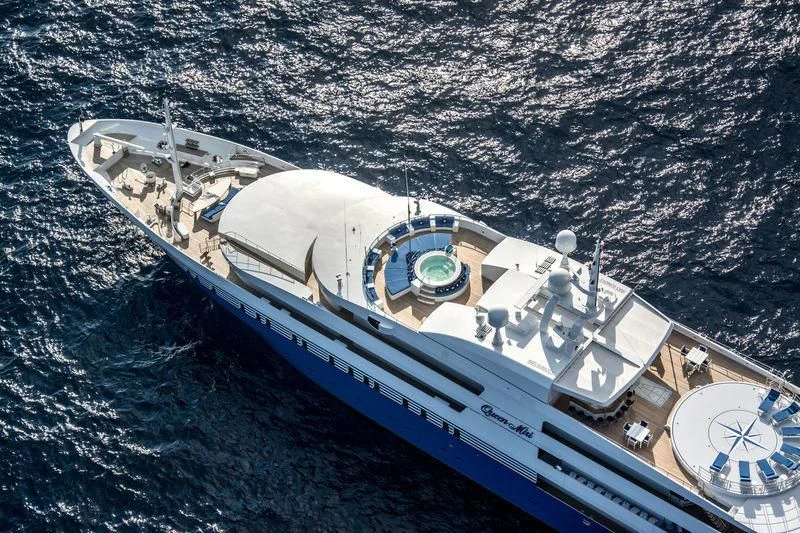 a boat in the water aboard QUEEN MIRI Yacht for Sale