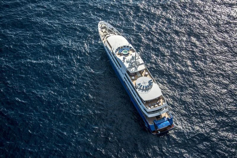 a boat in the water aboard QUEEN MIRI Yacht for Sale