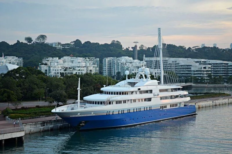 a large blue and white boat aboard QUEEN MIRI Yacht for Sale