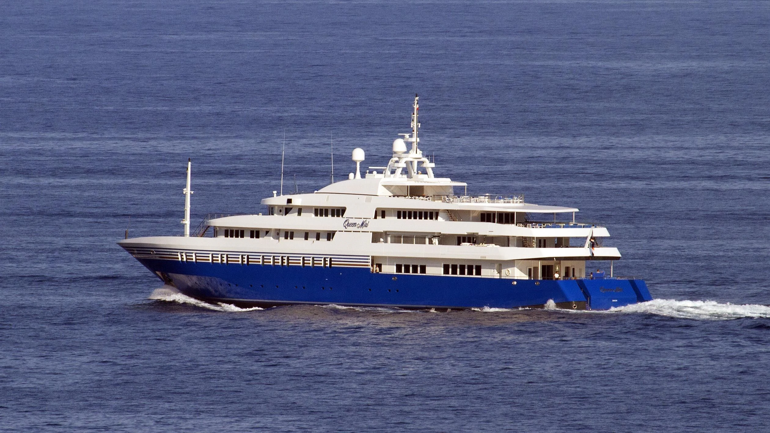 a large blue and white boat aboard QUEEN MIRI Yacht for Sale