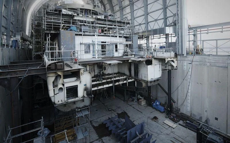 a large room with machinery aboard QUEEN MIRI Yacht for Sale