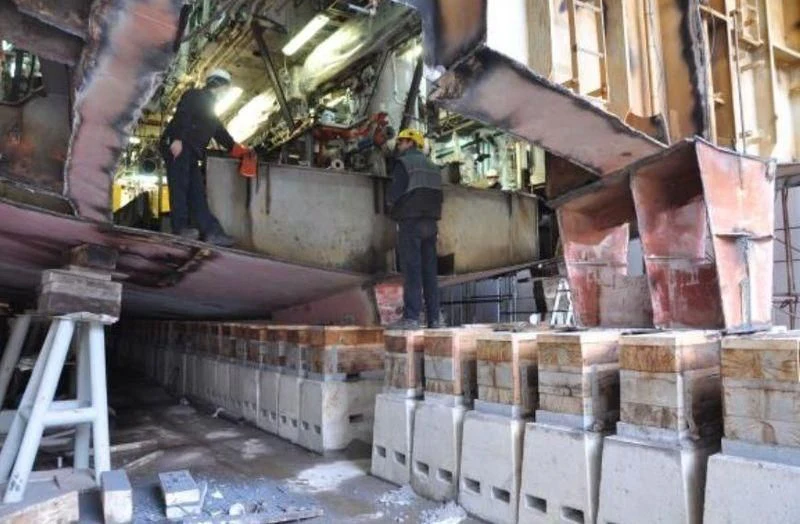 a large room with a large pile of bricks aboard QUEEN MIRI Yacht for Sale