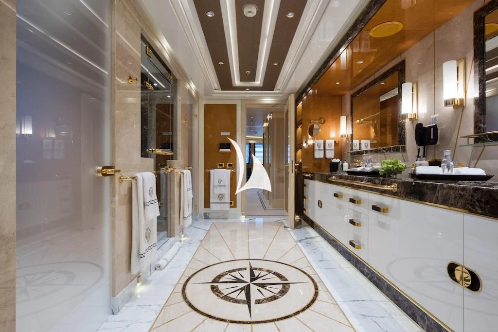 a bathroom with a large mirror aboard QUEEN MIRI Yacht for Sale