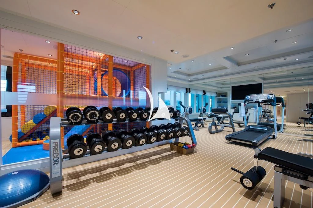 a large mural in a building aboard QUEEN MIRI Yacht for Sale