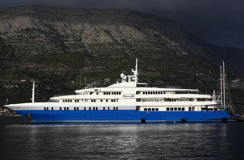 a large white boat in the water aboard QUEEN MIRI Yacht for Sale