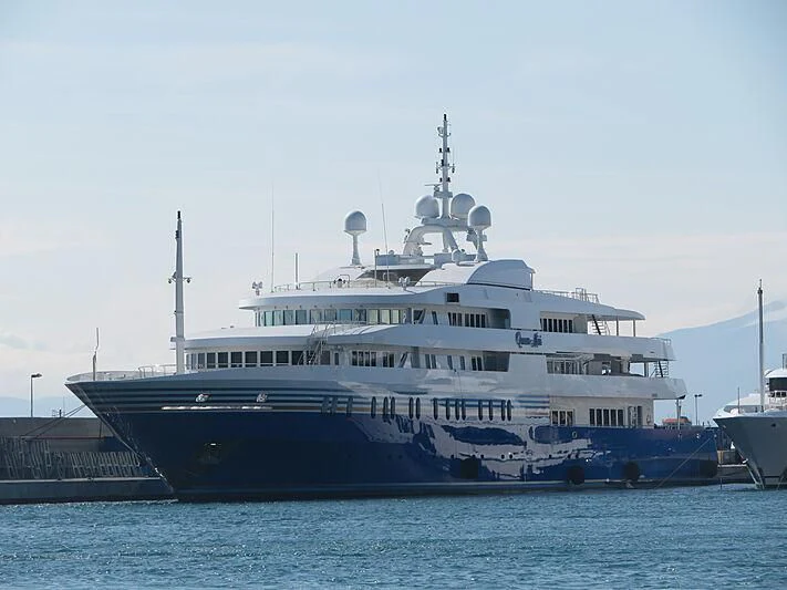 a large white ship aboard QUEEN MIRI Yacht for Sale