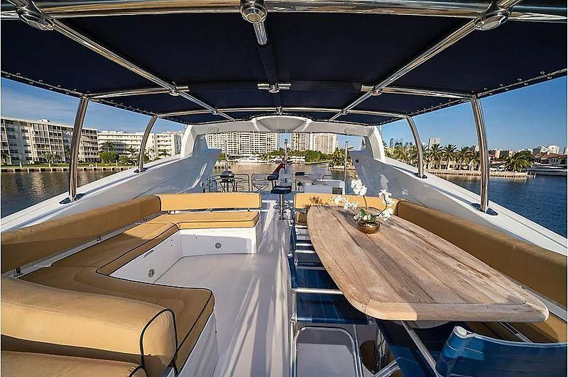 a deck with a view of a city and water aboard BEYOND Yacht for Sale